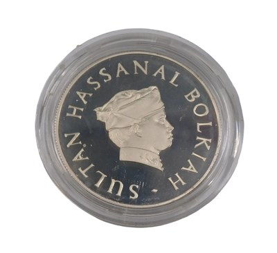 Lot 151 - A Brunei ten dollar silver coin, in...