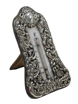 Lot 885 - An Edward VII silver fronted desk thermometer,...