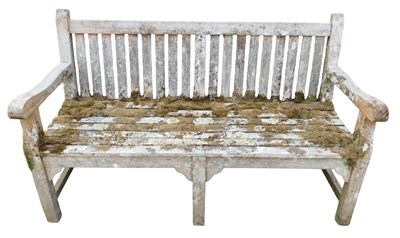 Lot 983 - An early 20thC slatted wooden garden bench,...