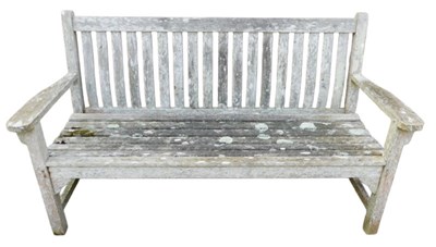 Lot 984 - An early 20thC slatted wooden garden bench,...