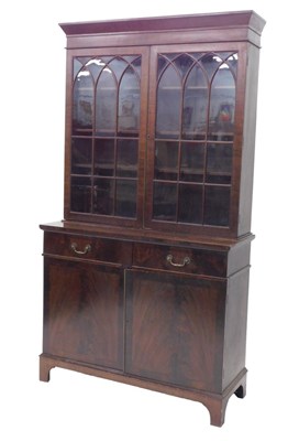 Lot 1007 - A 19thC mahogany bookcase, the upper section...