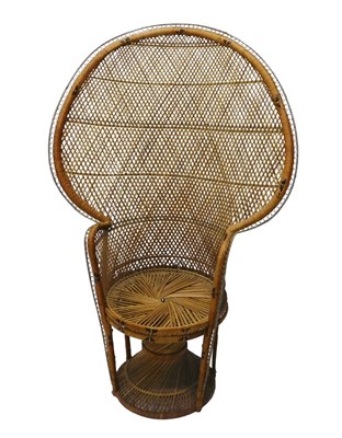 Lot 1020 - An early 20thC wicker cane beehive chair, with...
