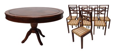 Lot 1027 - A 20thC hardwood circular dining table, on a...
