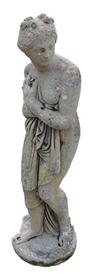 Lot 1001 - A Grecian-style classical stone statue, formed...