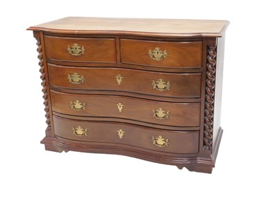 Lot 1040 - An early 20thC serpentine mahogany chest, of...