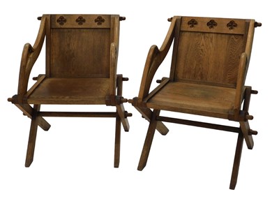 Lot 1041 - A pair of early 20thC oak Glastonbury chairs,...