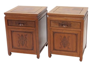 Lot 1063 - A pair of Oriental design hardwood pedestal...