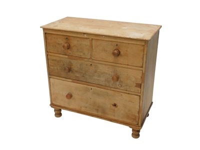 Lot 1080 - An early 20thC pine chest, of two short and...