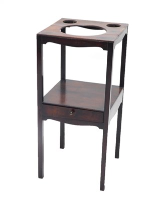 Lot 1079 - A 19thC mahogany washstand, the square top...