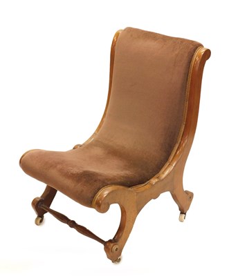 Lot 1085 - A Victorian mahogany nursing chair, of scroll...