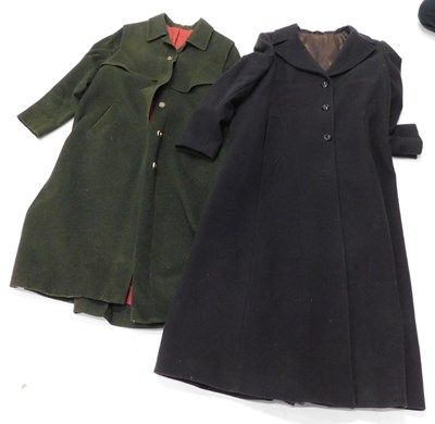 Lot 1094 - A full length green woollen overcoat, with red...