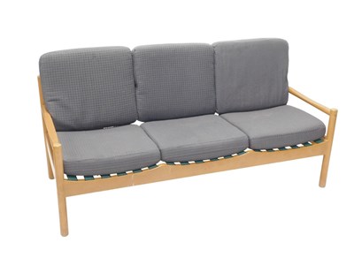 Lot 1096 - A light beech Ercol style low settee, with...