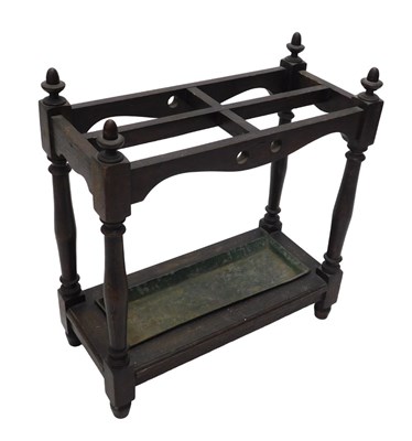 Lot 1101 - An early 20thC oak stick stand, of rectangular...