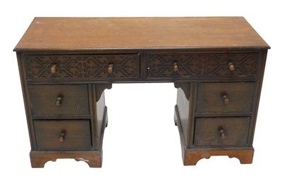 Lot 1104 - A 20thC oak dressing table, of rectangular...