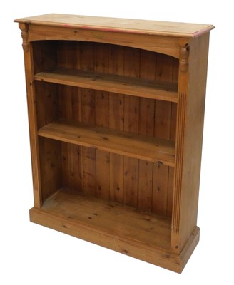Lot 1120 - A mid 20thC pine open bookcase, of rectangular...