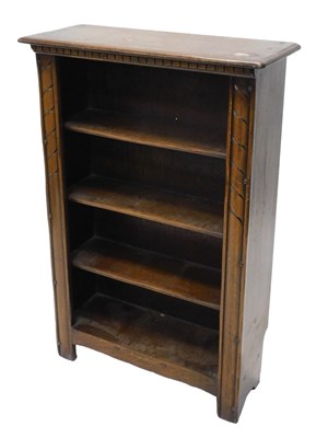 Lot 1121 - A 20thC oak freestanding open bookcase, of...