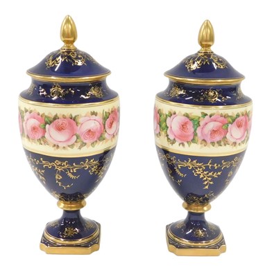 Lot 1149 - A pair of early 20thC Coalport vases, each of...
