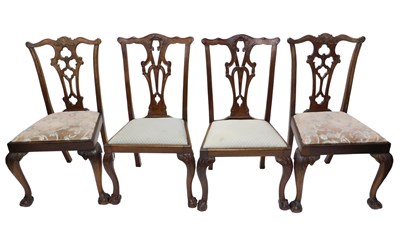 Lot 1118 - A set of four George III style mahogany dining...