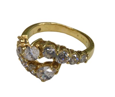 Lot 1147 - An 18ct gold dress ring, of two row twist...