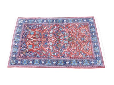 Lot 1175 - A knotted Persian style rug, of rectangular...